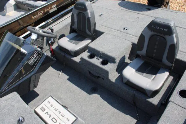 Slide: The Image of 2023 Lowe Stinger 178 boat interior with dual seats and steering console. - 5