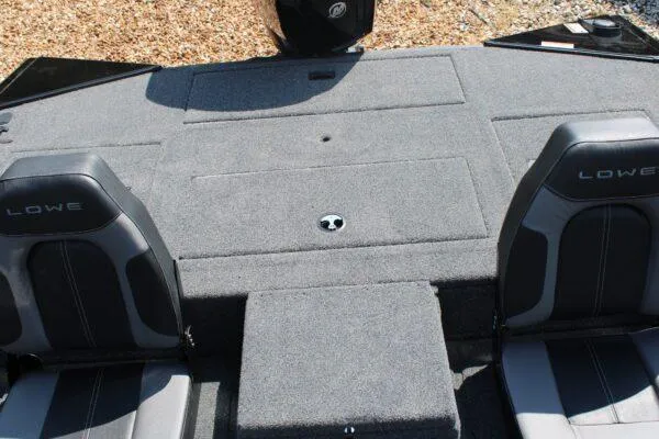 Slide: The Image of 2023 Lowe Stinger 178 boat interior with two seats and carpeted deck. - 8