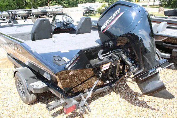 Slide: The Image of 2023 Lowe Stinger 178 boat with Mercury outboard motor on trailer. - 9