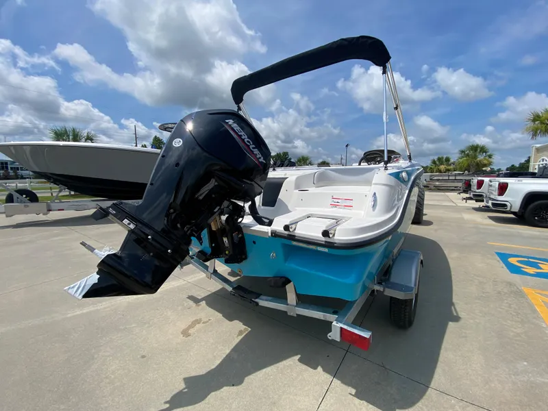Slide: The Image of 2024 Bayliner Element M17 boat with Mercury outboard motor on trailer. - 3