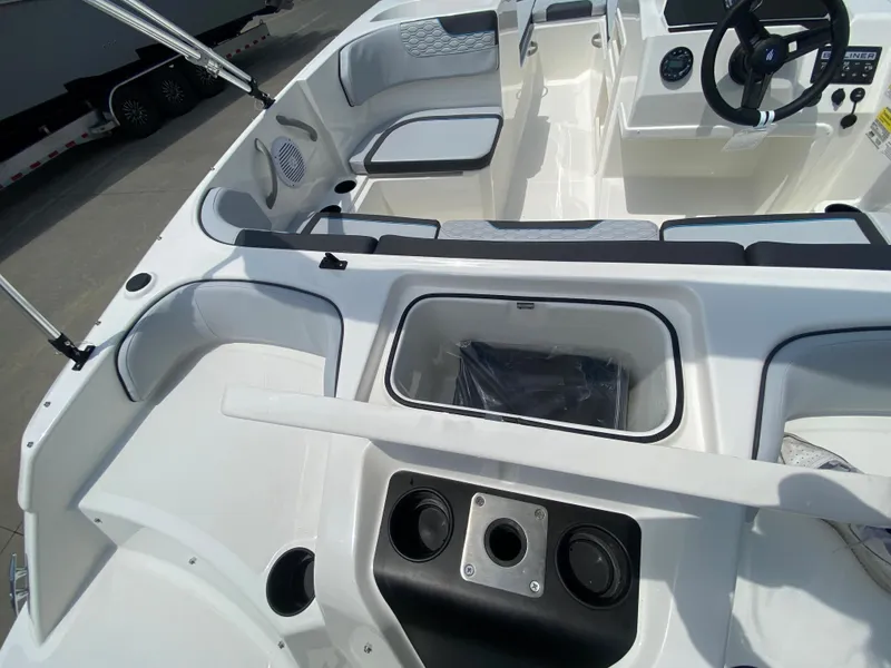 Slide: The Image of 2024 Bayliner Element M17 boat interior with seating and storage compartments. - 6