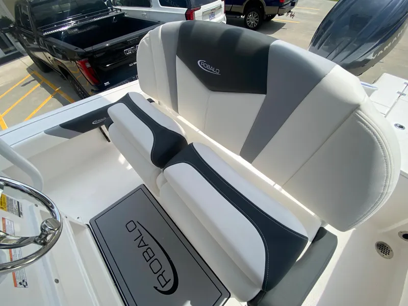 Slide: The Image of 2024 Robalo 226 Cayman boat seating and interior details. - 11