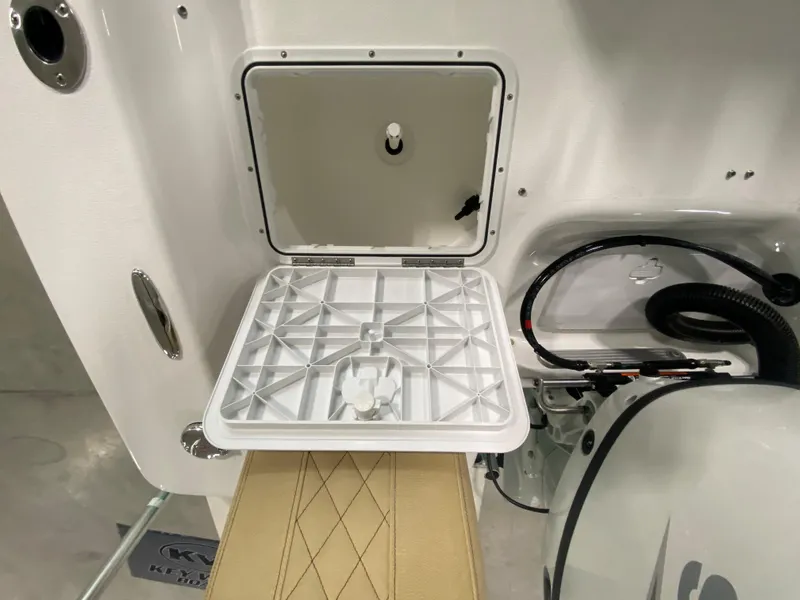 Slide: The Image of 2024 Savannah SS19 boat storage compartment with open hatch. - 11