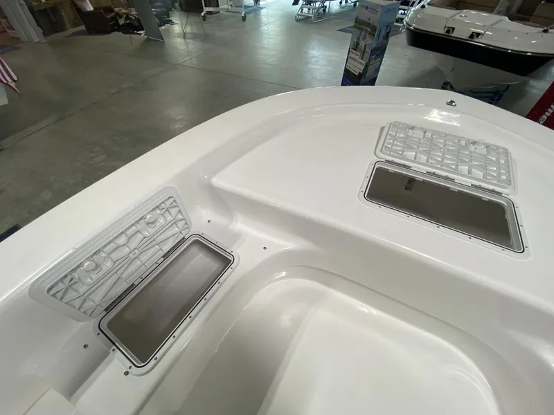 Slide: The Image of 2024 Savannah SS19 boat interior with storage compartments. - 19