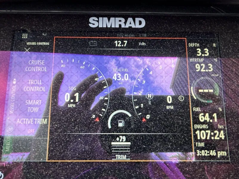 Slide: The Image of Simrad display on 2022 Bennington L25 showing vessel control and engine data. - 6
