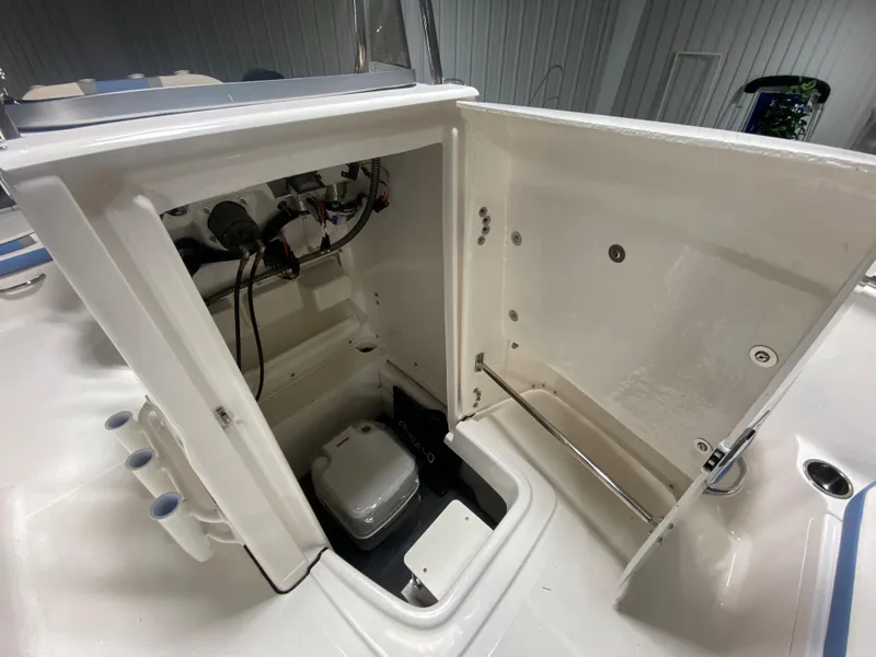 Slide: The Image of 2024 Robalo R180 Center Console storage compartment and wiring. - 14