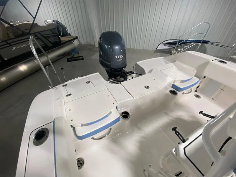 Slide: The Image of 2024 Robalo R180 Center Console boat interior with Yamaha 115 outboard motor. - 7