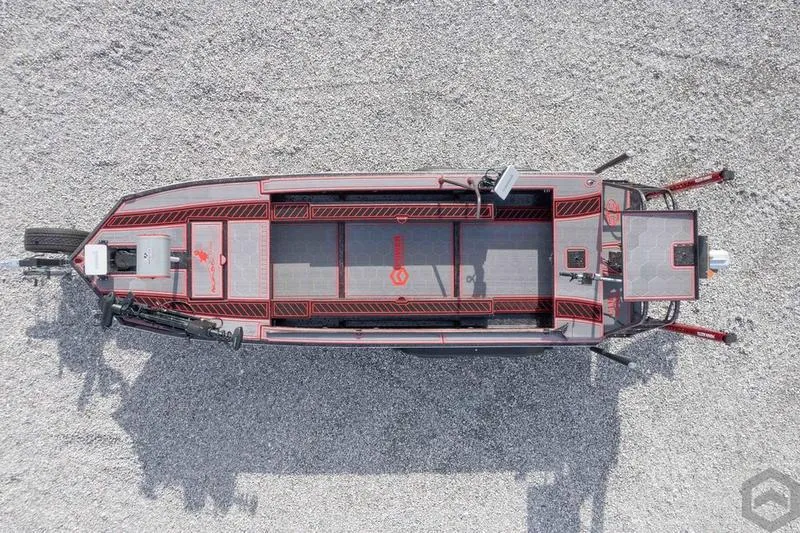 Slide: The Image of Top view of a 2023 Go-Devil 2060 boat on gravel. - 16