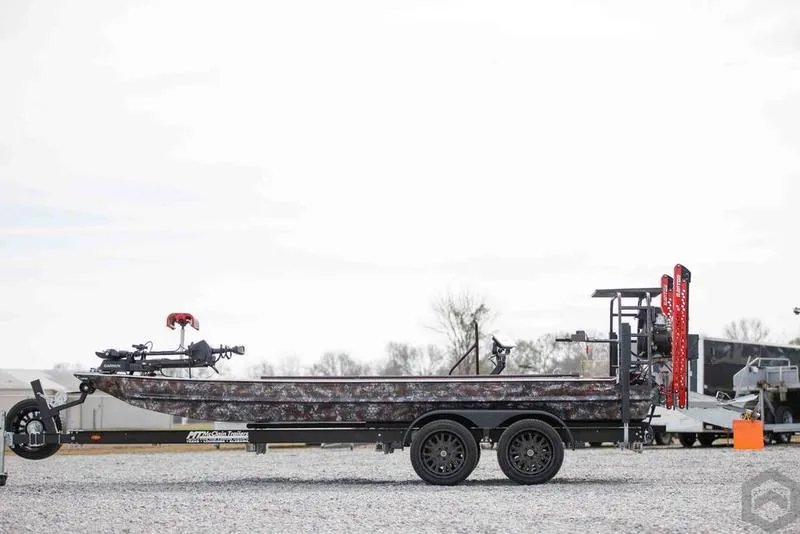 Slide: The Image of 2023 Go-Devil 2060 boat on a trailer, side view. - 19