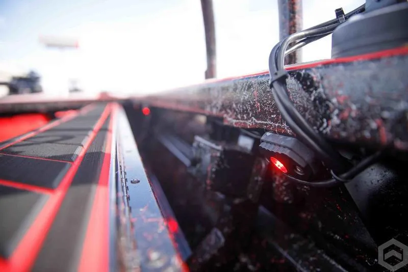 Slide: The Image of Close-up of 2023 Go-Devil 2060 boat interior with red and black detailing. - 20