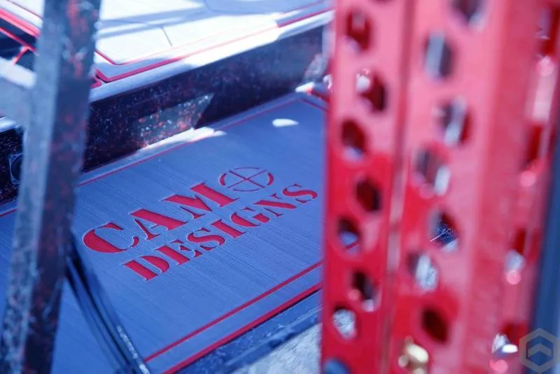 Slide: The Image of Go-Devil 2060 2023 model with CAM Designs branding, red and black color scheme. - 22