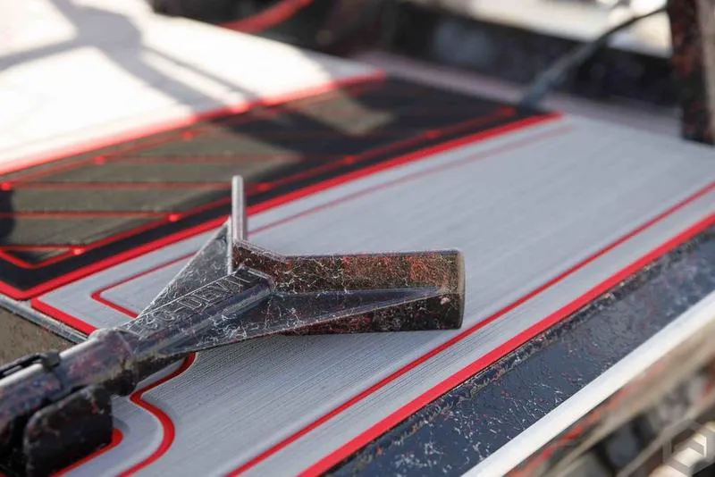 Slide: The Image of Close-up of Go-Devil 2060 boat deck, 2023 model, with red and black detailing. - 24