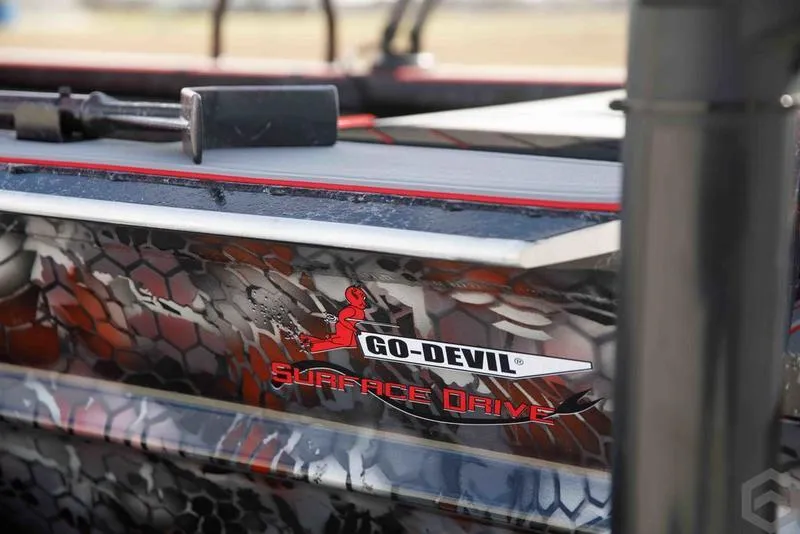 Slide: The Image of 2023 Go-Devil 2060 Surface Drive boat with camouflage design. - 25
