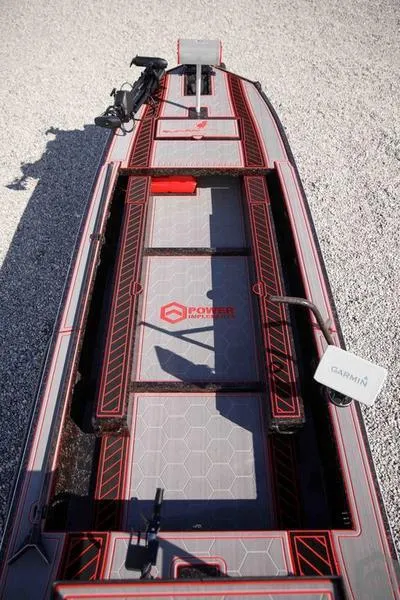 Slide: The Image of 2023 Go-Devil 2060 boat with red and gray deck, Garmin equipment. - 29