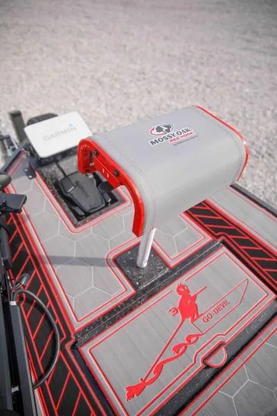 Slide: The Image of 2023 Go-Devil 2060 boat interior with custom seating and Garmin equipment. - 8