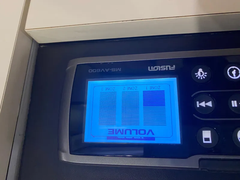 Slide: The Image of Control panel of a Fusion MS-AV600 audio system on a 1996 Carver 390 Express. - 33
