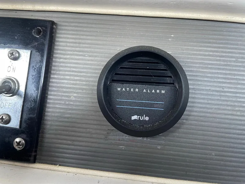 Slide: The Image of 1961 Chris-Craft Conqueror water alarm gauge on dashboard panel. - 10