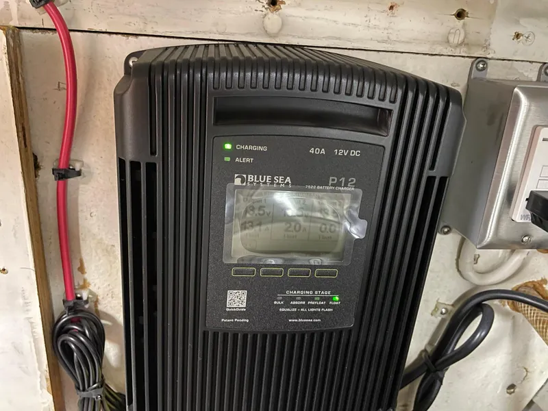 Slide: The Image of Blue Sea Systems battery charger in a 1961 Chris-Craft Conqueror boat. - 49