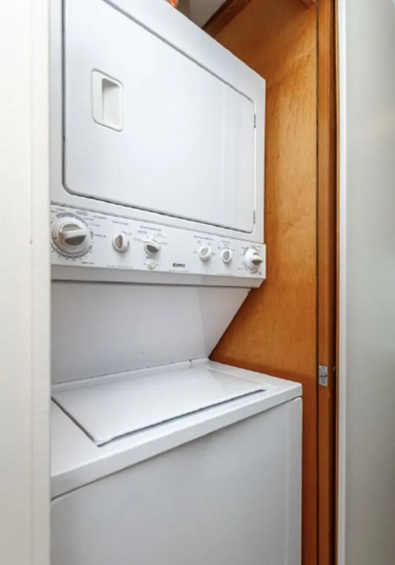 Slide: The Image of Stacked washer and dryer unit in a 2007 Horizon 18 x 80 houseboat. - 16