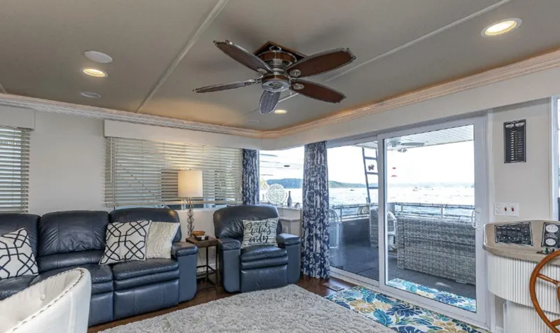 Slide: The Image of Luxurious 2007 Horizon 18 x 80 houseboat interior with leather seating and lake view. - 7