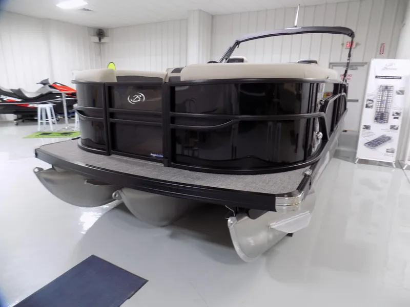 Slide: The Image of 2024 Barletta C22UC pontoon boat in showroom, front view. - 5