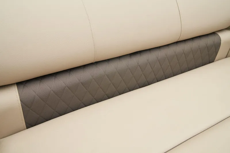Slide: The Image of 2024 Sun Tracker SportFish 22 XP3 beige and gray quilted boat seat upholstery. - 23