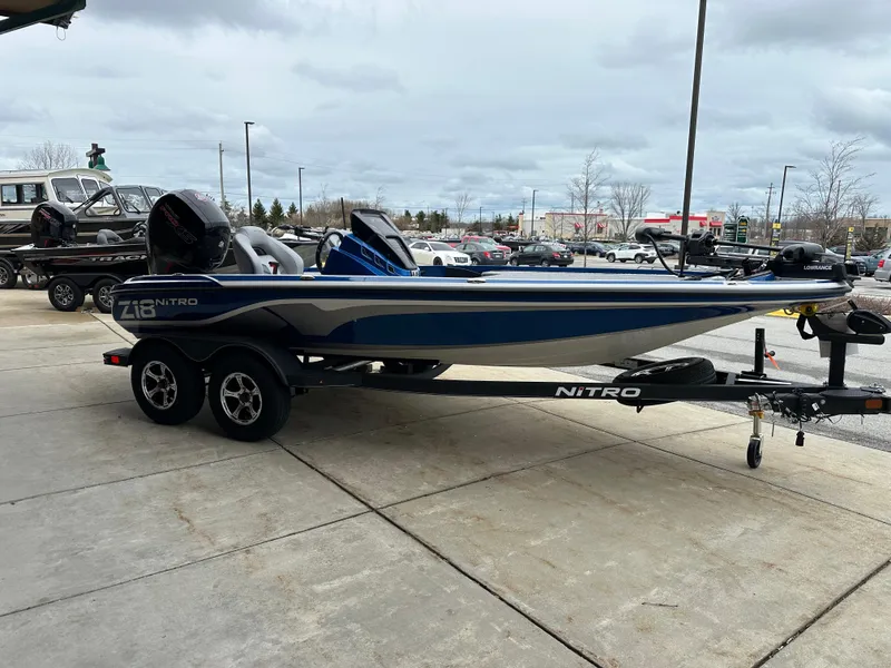 Slide: The Image of 2024 Nitro Z18 Pro boat on trailer in parking lot. - 1