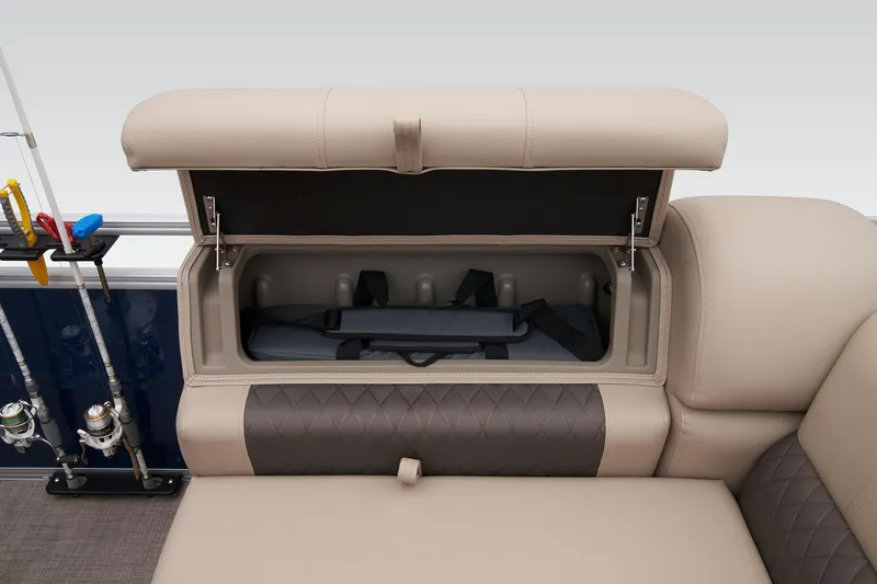 Slide: The Image of Sun Tracker Fishin' Barge 22 XP3 2024 storage compartment and fishing rod holders. - 23