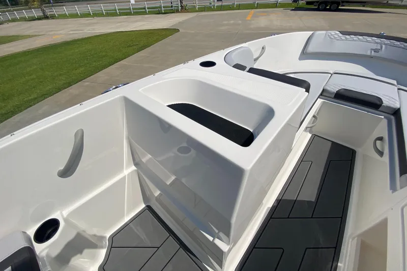 Slide: The Image of 2024 Bayliner Element M19 boat interior with seating and storage compartments. - 12