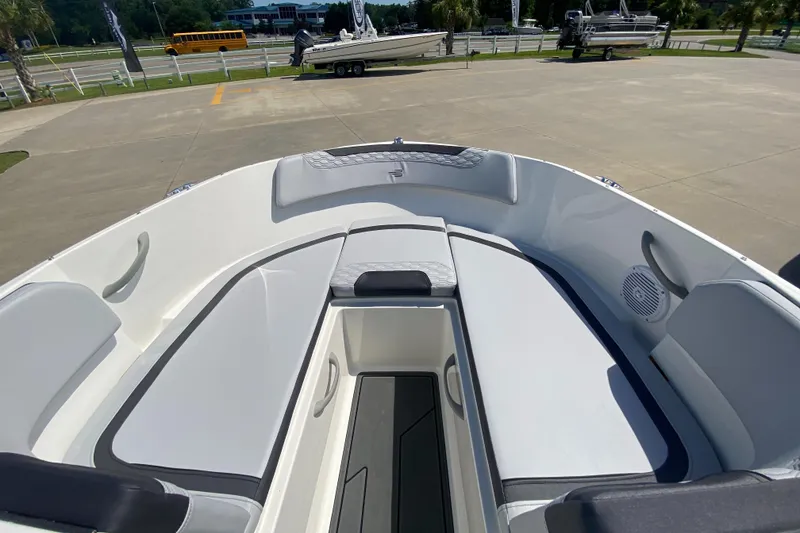 Slide: The Image of 2024 Bayliner Element M19 boat interior with spacious seating and storage compartments. - 13