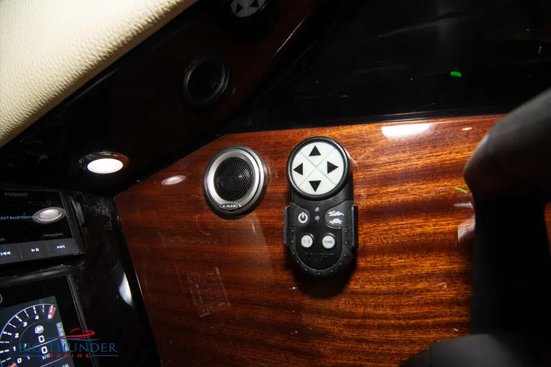 Slide: The Image of Control panel of 2023 Chris-Craft Launch 31 GT with wood finish and joystick. - 40
