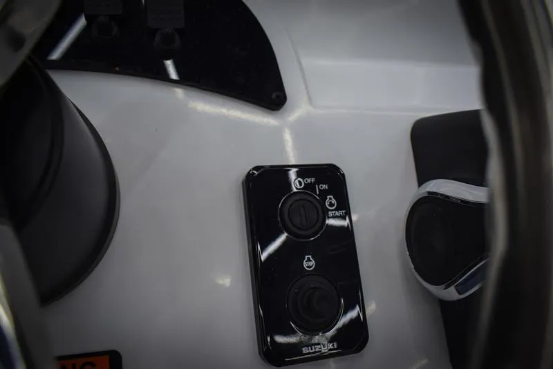Slide: The Image of Control panel of a 2023 Savannah SS19 boat with Suzuki ignition. - 17