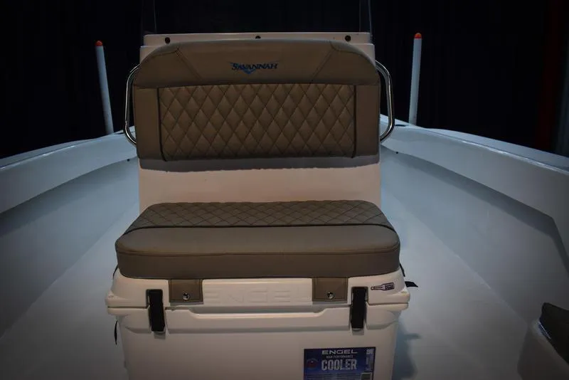 Slide: The Image of Savannah SS19 2023 boat with cushioned seating and Engel cooler. - 23