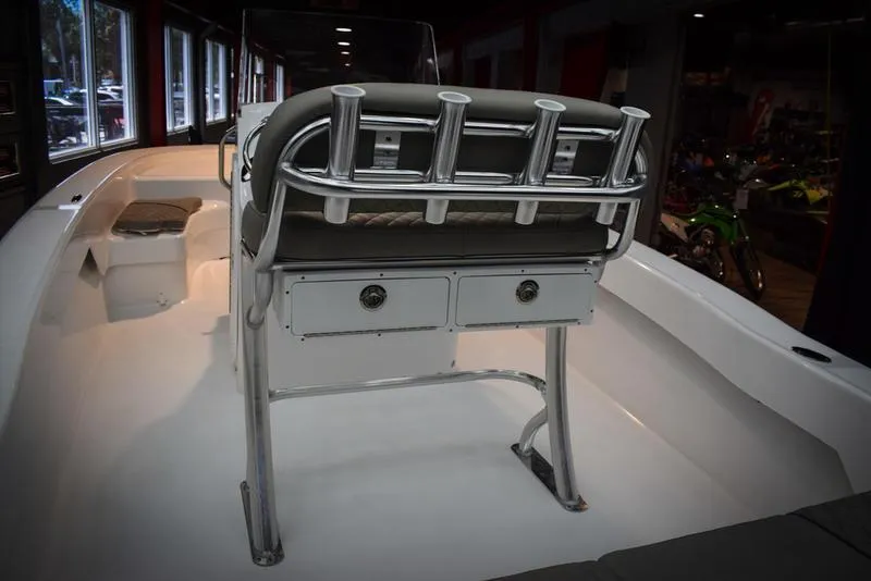 Slide: The Image of 2023 Savannah SS19 boat interior with rod holders and storage drawers. - 5