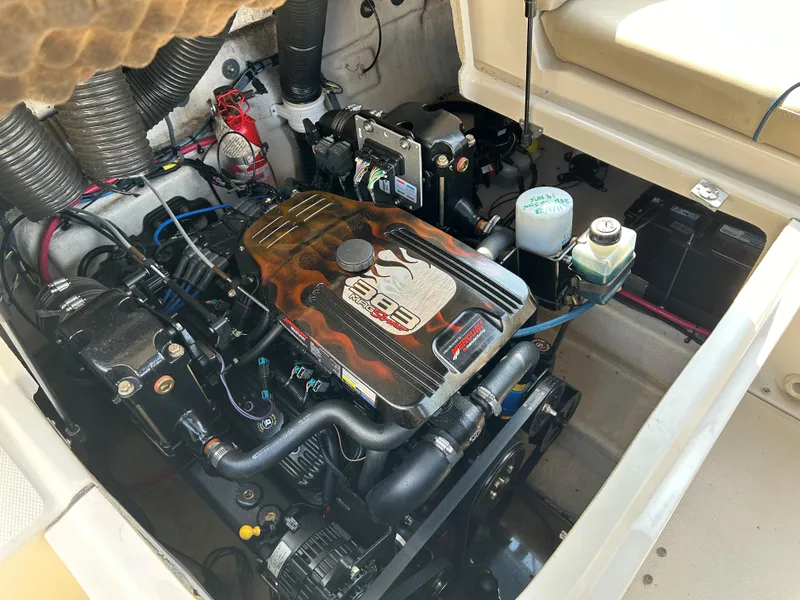 Slide: The Image of 2007 Sea Ray 240 Sundeck engine compartment, showcasing detailed mechanical components. - 15