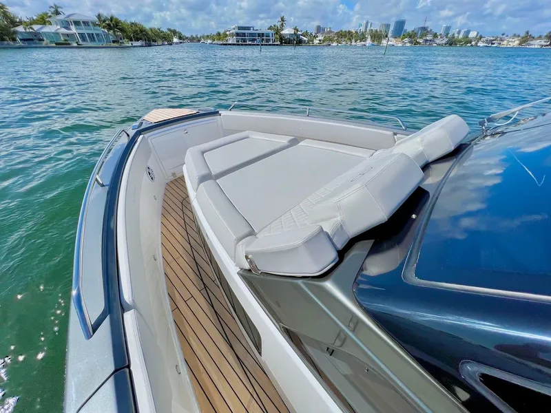 Slide: The Image of 2025 Schaefer V33 yacht with luxurious deck and waterfront view. - 5