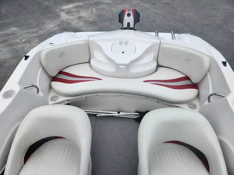 Slide: The Image of 2007 Starcraft 1700 Limited boat interior with white and red seating. - 6