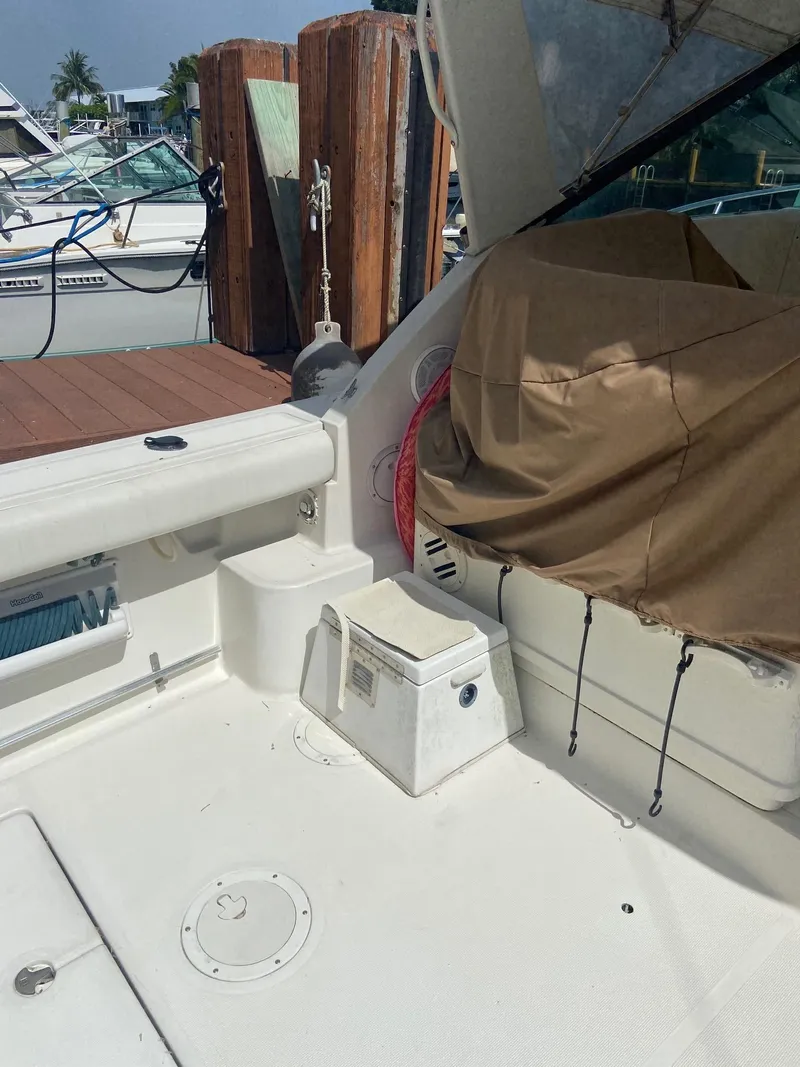 Slide: The Image of 1992 Tiara Yachts 31 Open boat deck with seating and storage. - 12