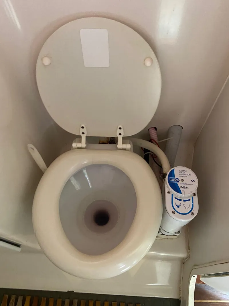 Slide: The Image of Toilet in 1992 Tiara Yachts 31 Open boat. - 35