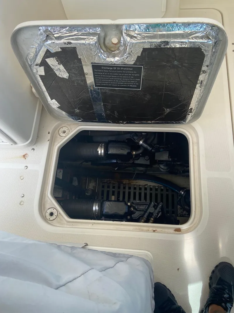 Slide: The Image of Engine compartment of a 1992 Tiara Yachts 31 Open. - 36