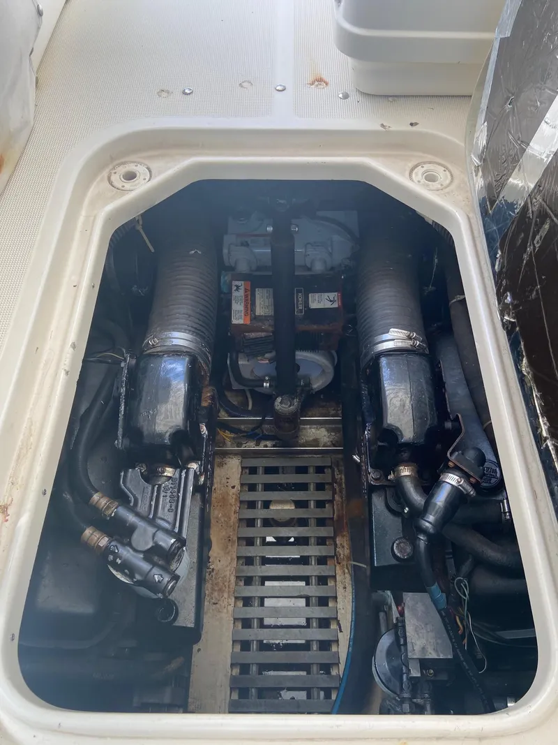 Slide: The Image of Engine compartment of a 1992 Tiara Yachts 31 Open boat. - 38