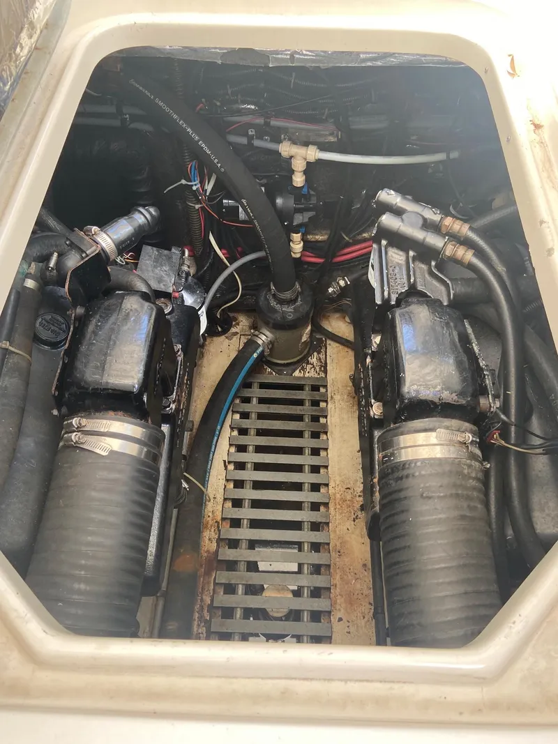 Slide: The Image of 1992 Tiara Yachts 31 Open engine compartment with visible components. - 39