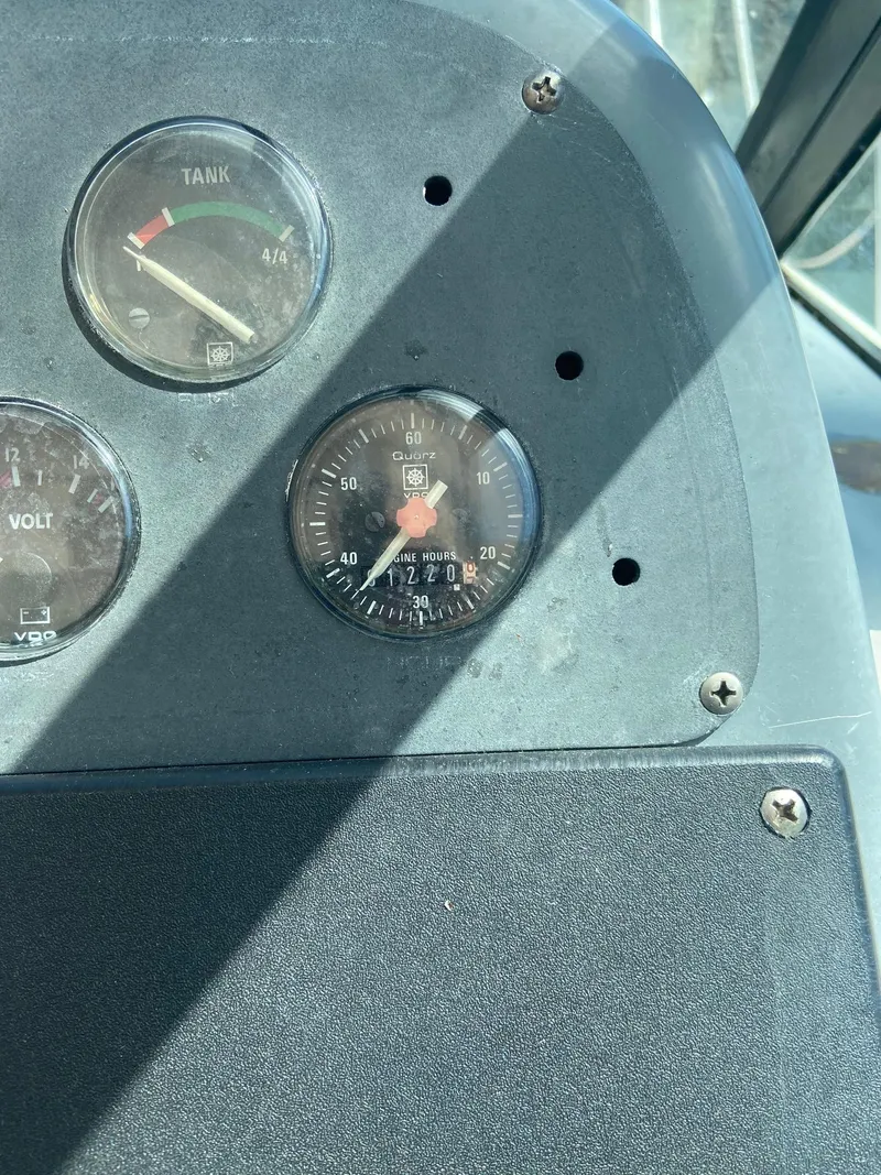 Slide: The Image of Instrument panel of a 1992 Tiara Yachts 31 Open boat. - 42