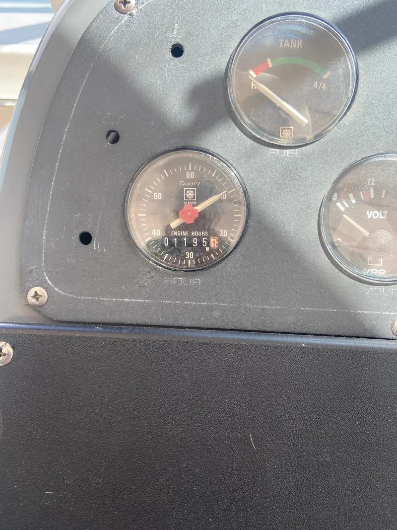 Slide: The Image of Dashboard gauges of a 1992 Tiara Yachts 31 Open boat. - 43