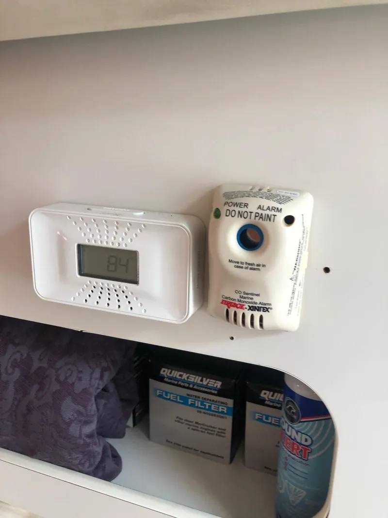 Slide: The Image of Carbon monoxide detector and thermostat inside a 1992 Tiara Yachts 31 Open. - 5