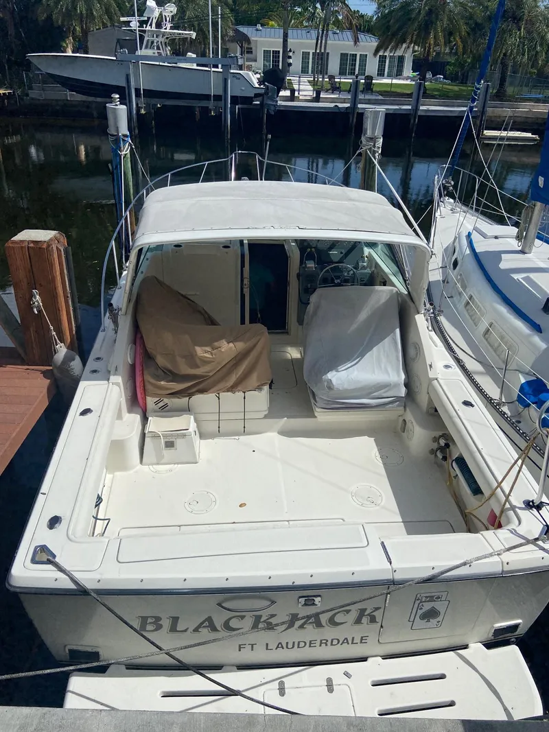 Slide: The Image of 1992 Tiara Yachts 31 Open docked in Ft. Lauderdale marina. - 6