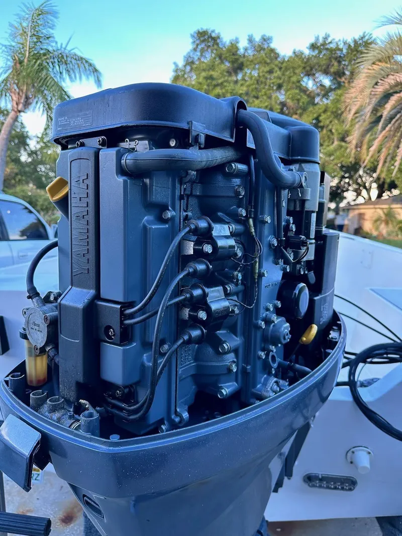 Slide: The Image of Close-up of a 1988 Mako 171 Center Console boat engine. - 12