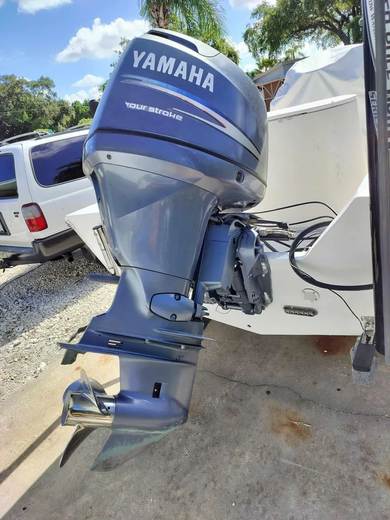 Slide: The Image of 1988 Mako 171 Center Console with Yamaha outboard motor. - 18