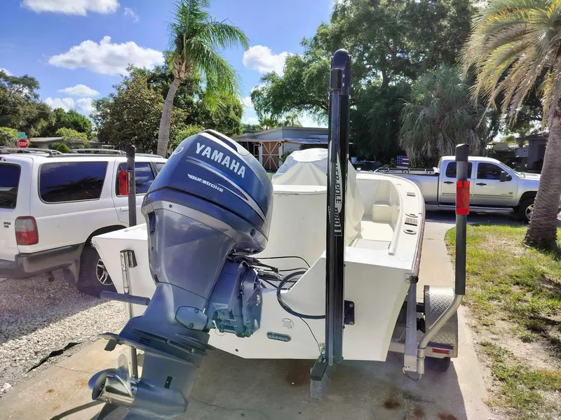 Slide: The Image of 1988 Mako 171 Center Console boat with Yamaha outboard motor on trailer. - 2