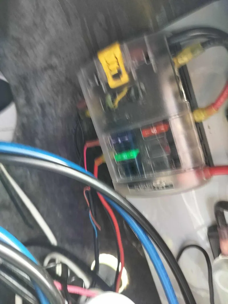 Slide: The Image of Electrical wiring and fuse box in a 1988 Mako 171 Center Console boat. - 20